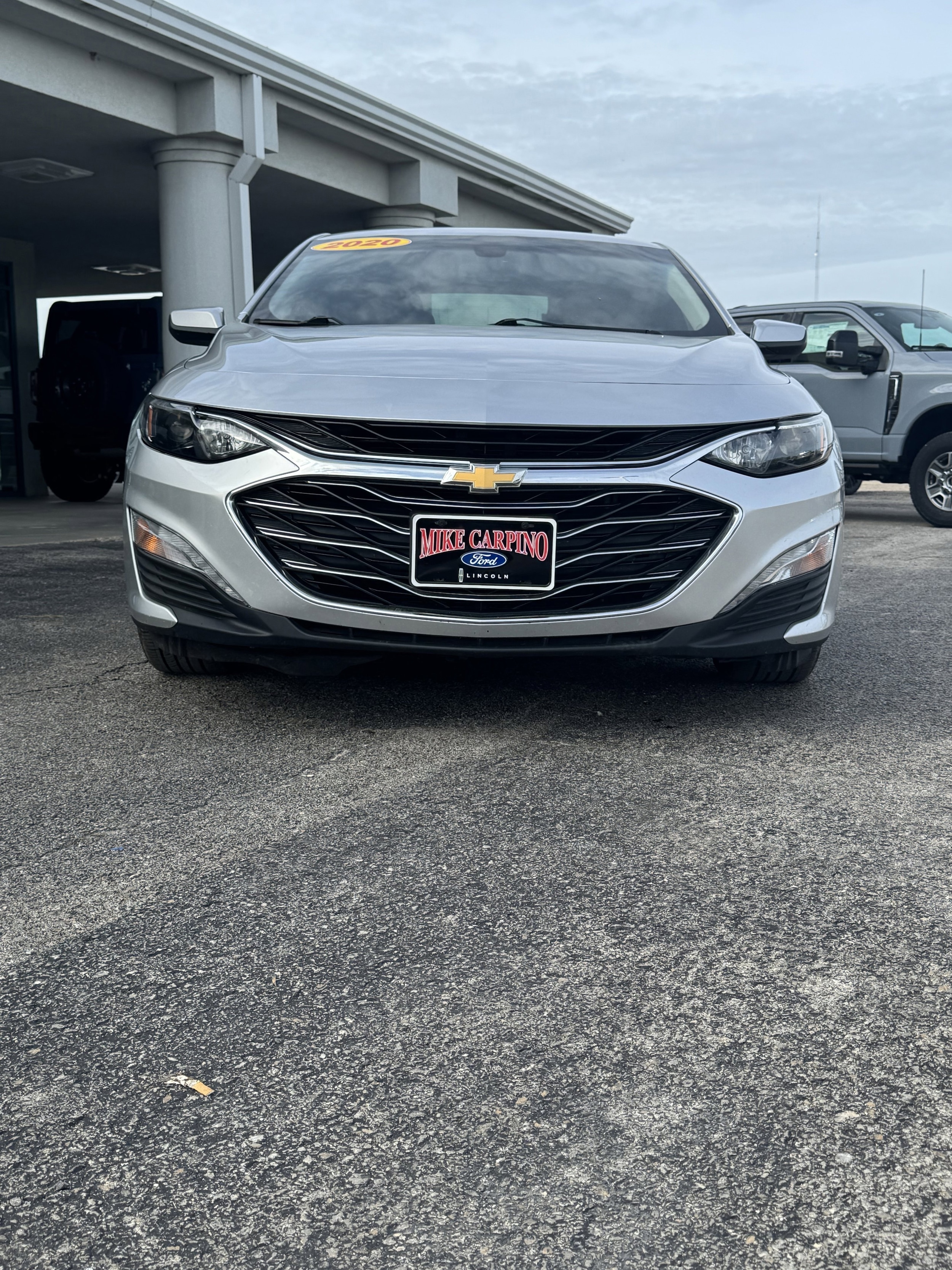 Used 2020 Chevrolet Malibu 1LT with VIN 1G1ZD5ST3LF094062 for sale in Parsons, KS