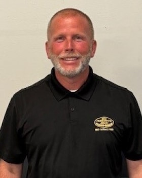 Staff member Roger Lyons from 396225507e0b