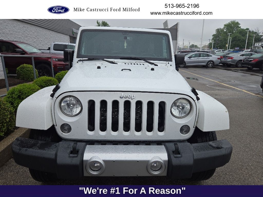 Used 2015 Jeep Wrangler Unlimited Sahara with VIN 1C4BJWEG3FL647398 for sale in Milford, OH