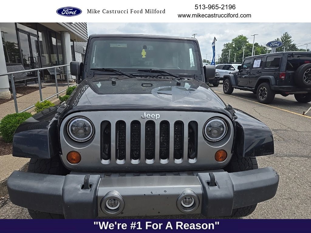 Used 2013 Jeep Wrangler Unlimited Sport with VIN 1C4BJWDG0DL579804 for sale in Milford, OH
