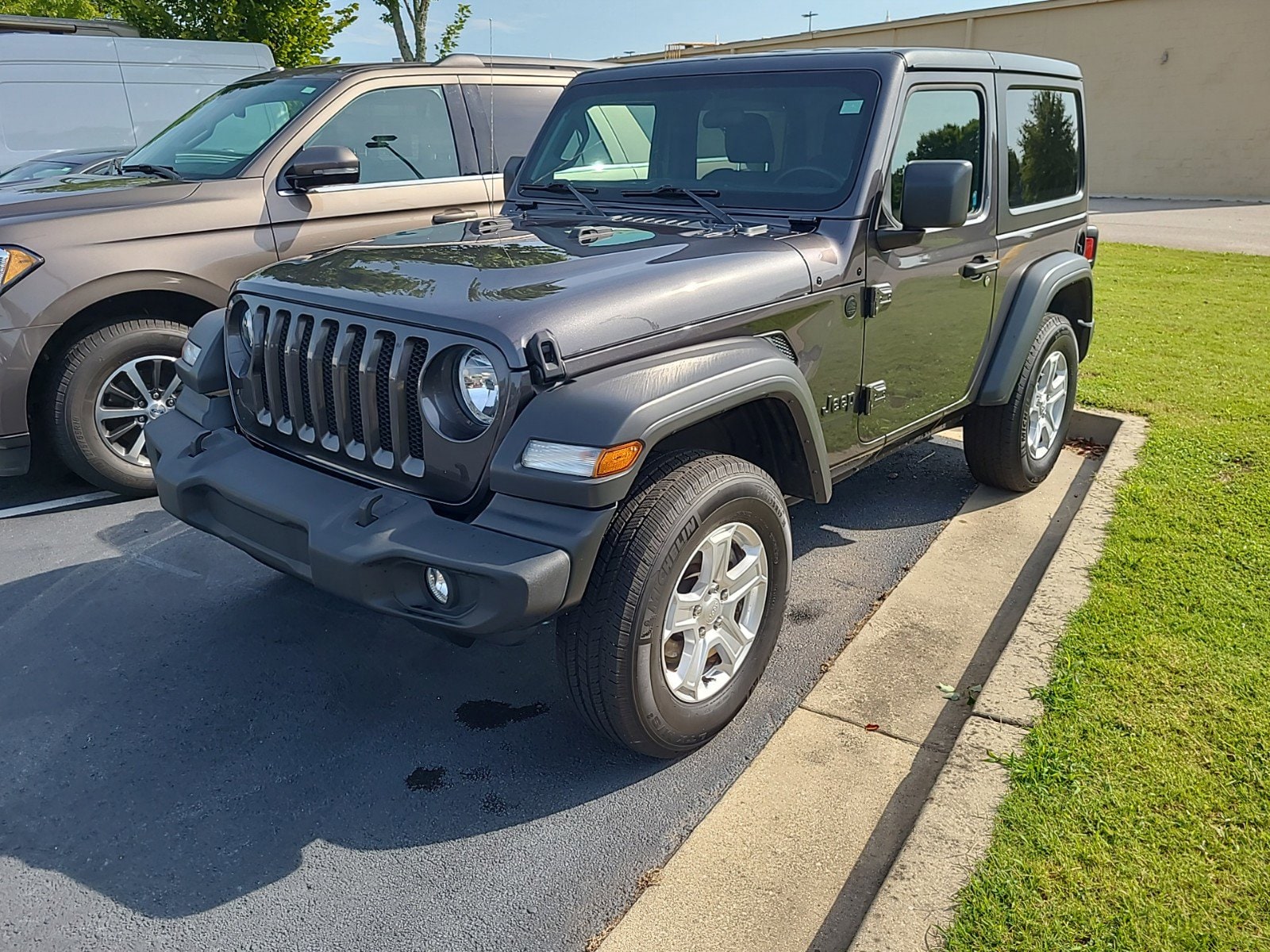 Used 2021 Jeep Wrangler Sport S with VIN 1C4GJXAN0MW760995 for sale in Eastanollee, GA