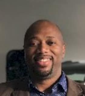 Staff member MARTINIS HUGHES from ID_bfa9b0c7d72e