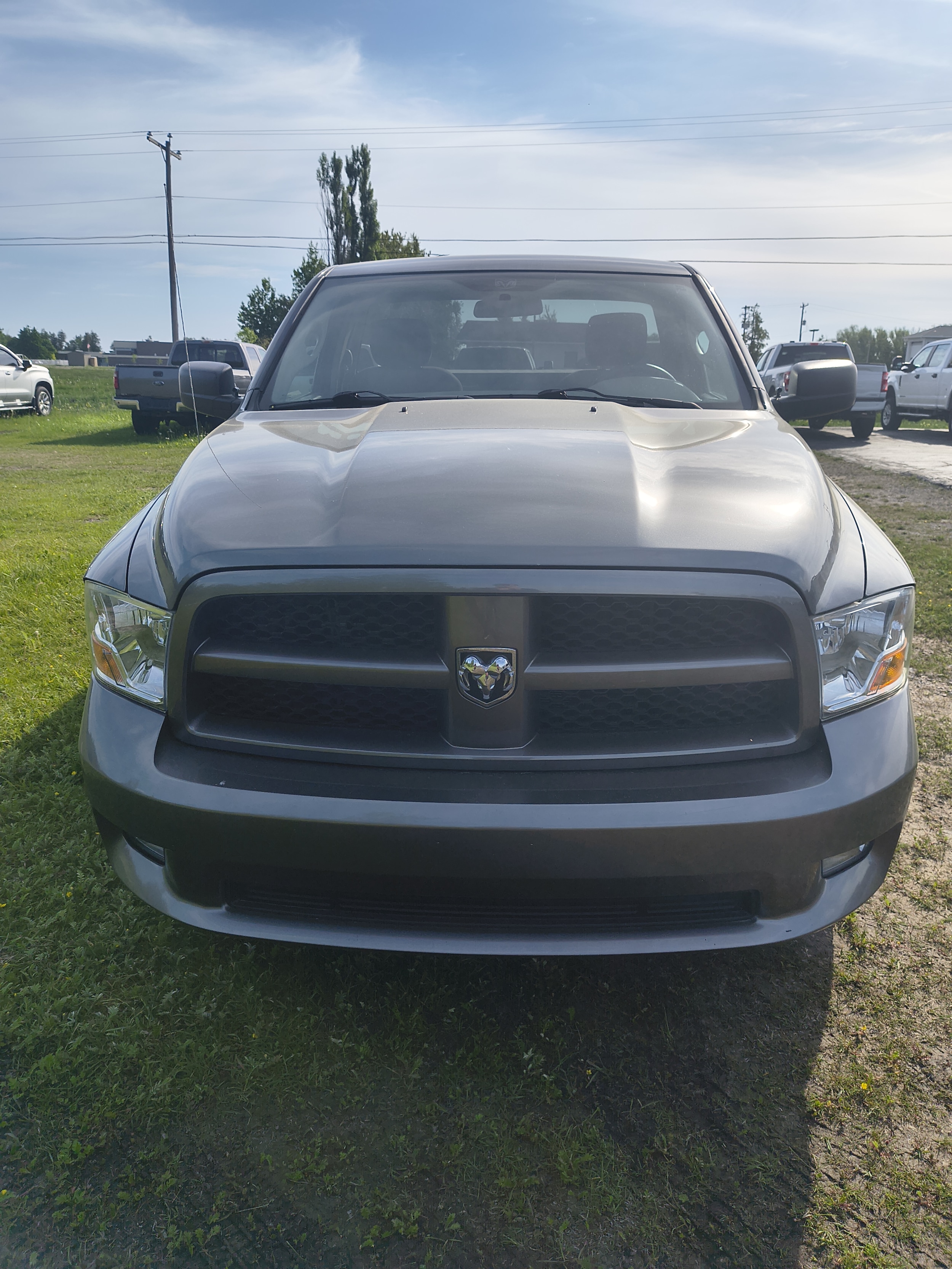 Used 2011 RAM Ram 1500 Pickup ST with VIN 3D7JV1ETXBG616128 for sale in Rogers City, MI