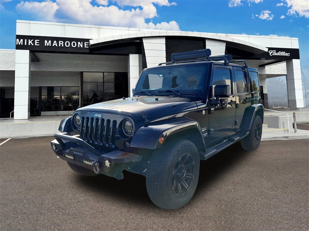 Used 2013 Jeep Wrangler Unlimited Sahara SUV