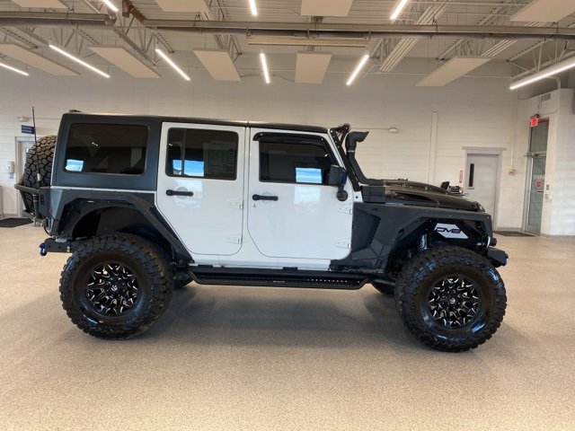 Used 2015 Jeep Wrangler Unlimited Rubicon with VIN 1C4BJWFG1FL530370 for sale in Colorado Springs, CO