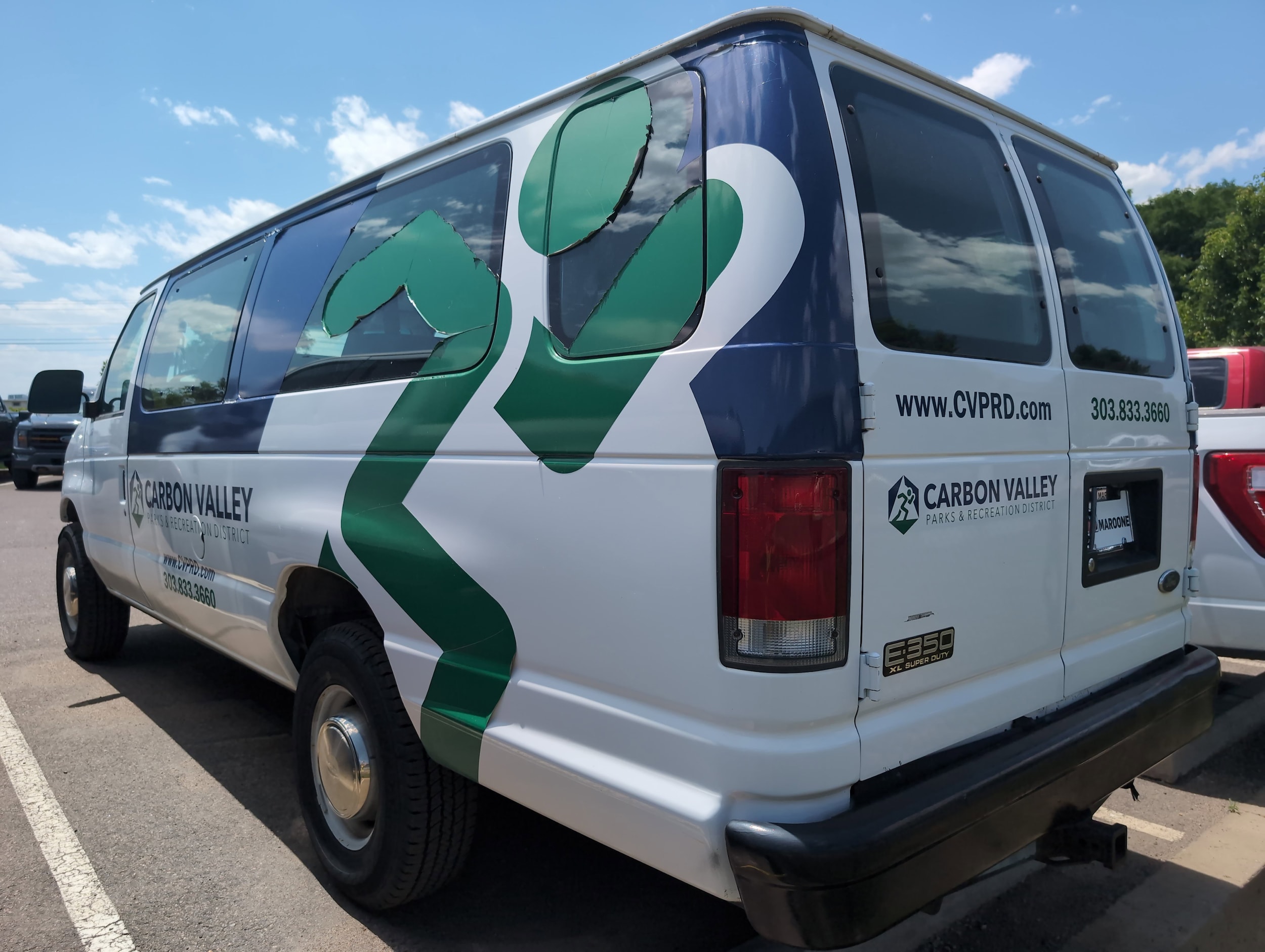 Used 2001 Ford Econoline Wagon XLT with VIN 1FBSS31L71HB12668 for sale in Longmont, CO
