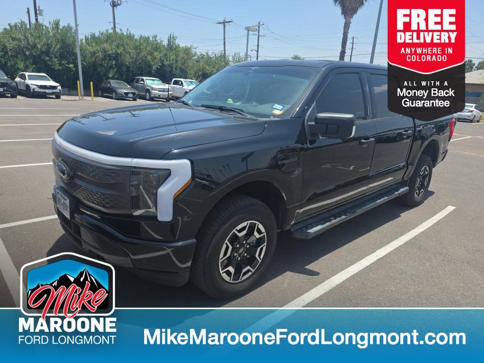 Used 2023 Ford F-150 Lightning XLT with VIN 1FTVW1EL7PWG63103 for sale in Longmont, CO