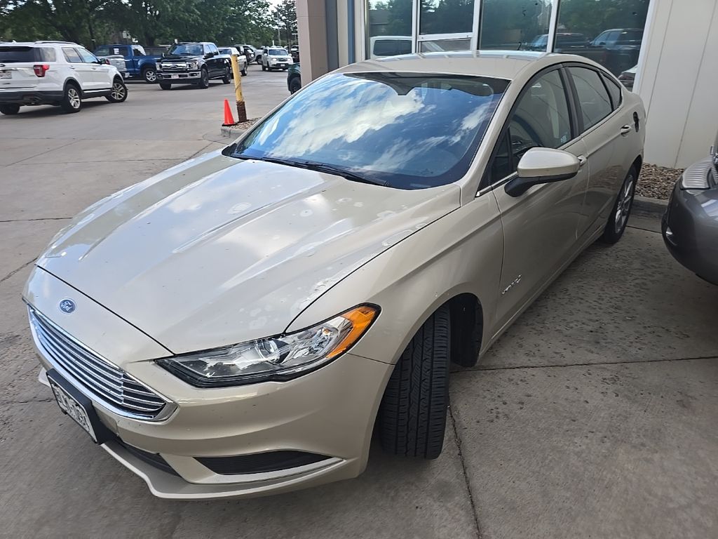 Used 2017 Ford Fusion Hybrid SE with VIN 3FA6P0LU1HR317775 for sale in Longmont, CO