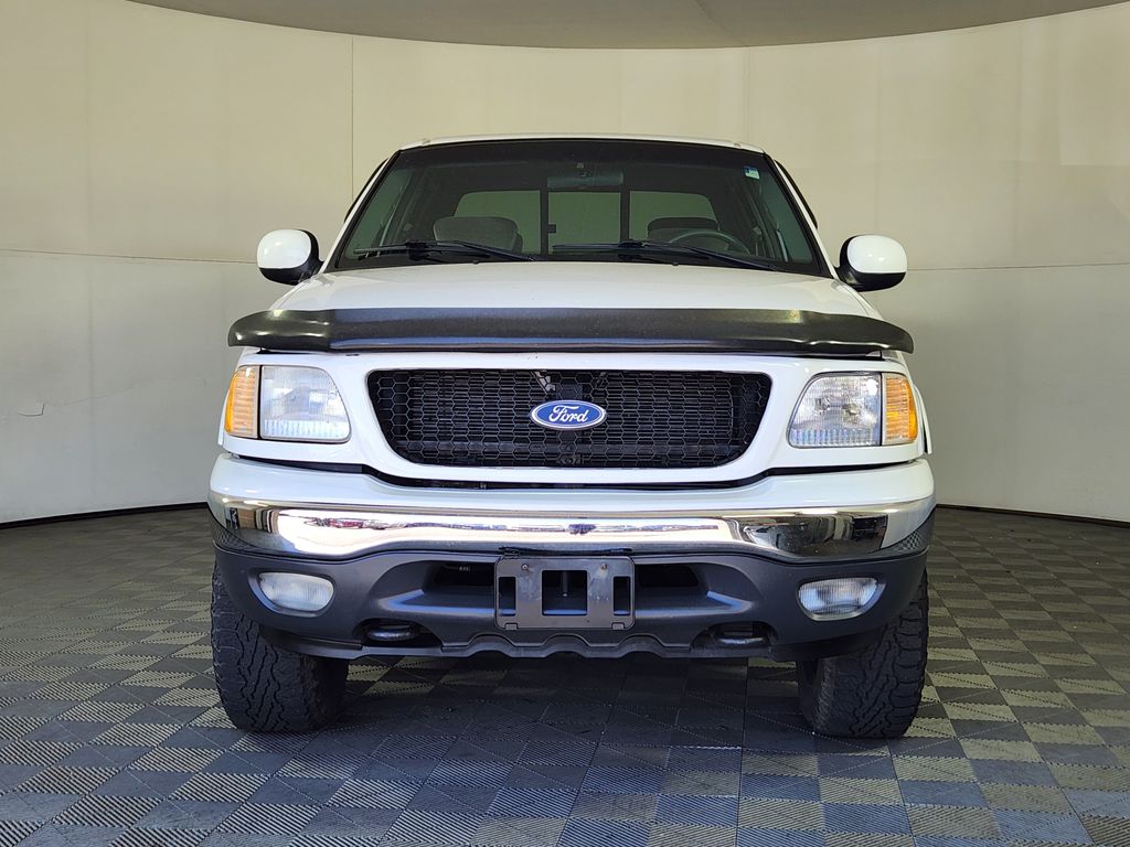 Used 2001 Ford F-150 XLT with VIN 1FTRW08L31KA77407 for sale in Longmont, CO