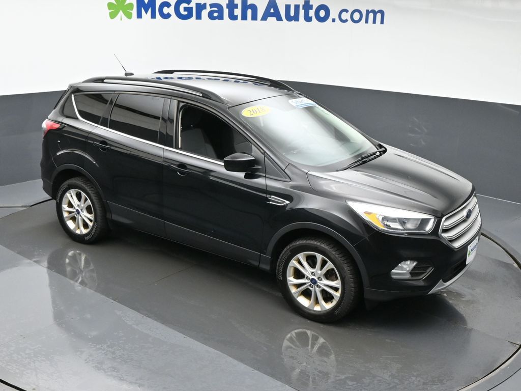 Used 2018 Ford Escape SE with VIN 1FMCU9GD9JUC12903 for sale in Cedar Rapids, IA