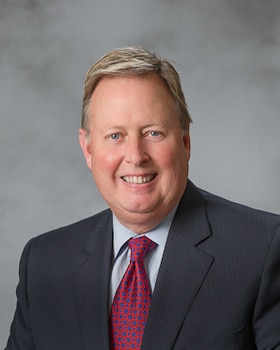 Staff member Tom Wallace from ID_888808