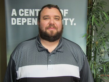 Staff member Andy Burwell from ID_5e9f5f61f27e