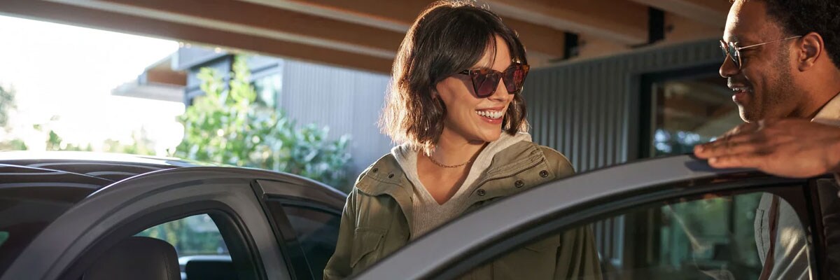 Woman Trading in Car at LAcarGUY Group