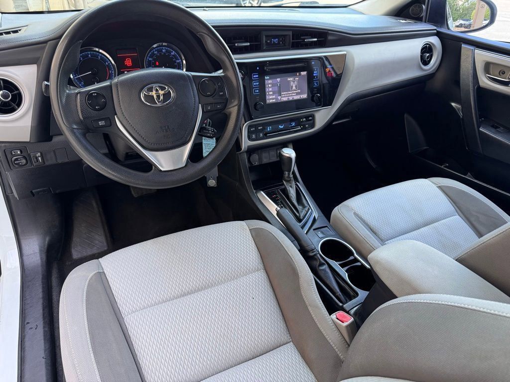 Used 2018 Toyota Corolla LE with VIN 5YFBURHE5JP846147 for sale in Silsbee, TX