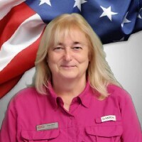 Staff member Kaye Elliott from e260d605deaa