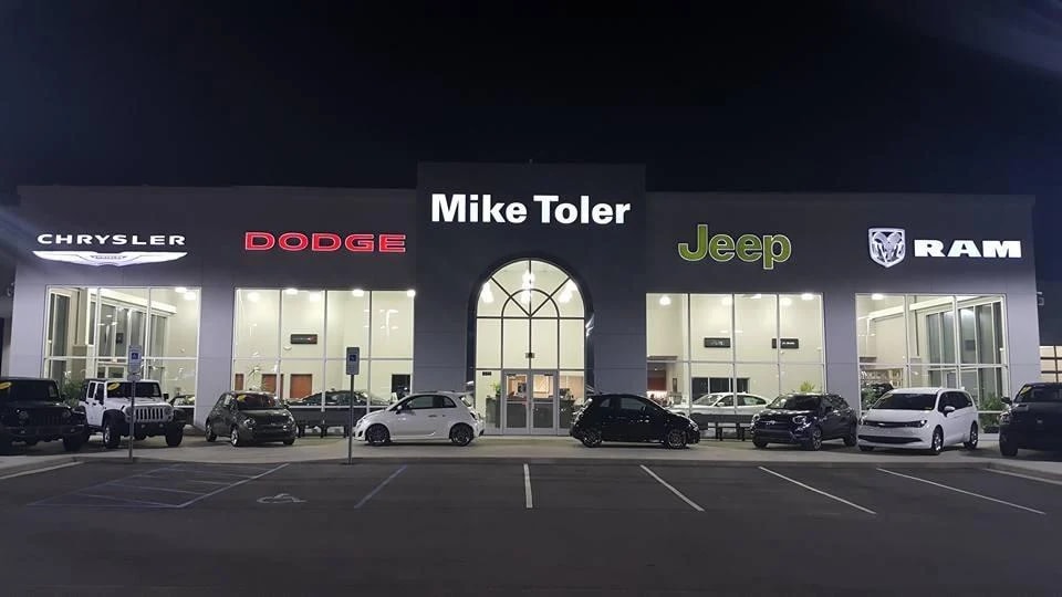 The front of Mike Toler Chrysler Dodge Jeep RAM FIAT at night
