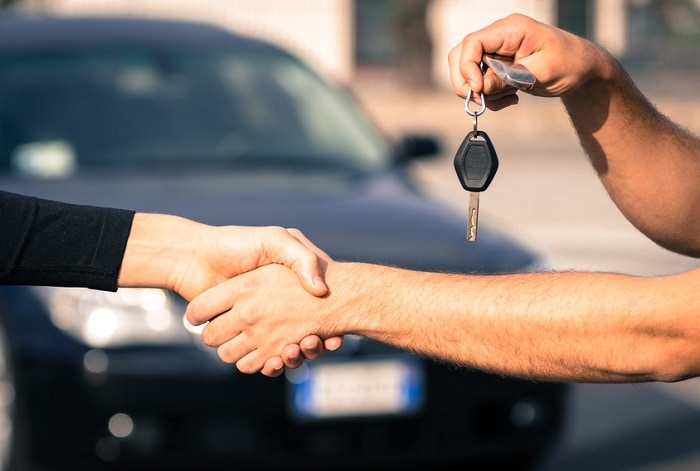 Shaking_Hands_After_Car_Sale.jpg