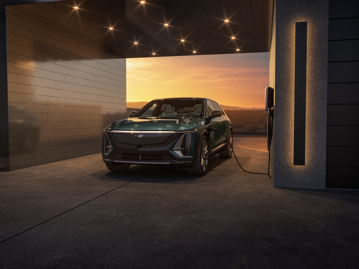 2025 Cadillac LYRIQ plugged into outlet.