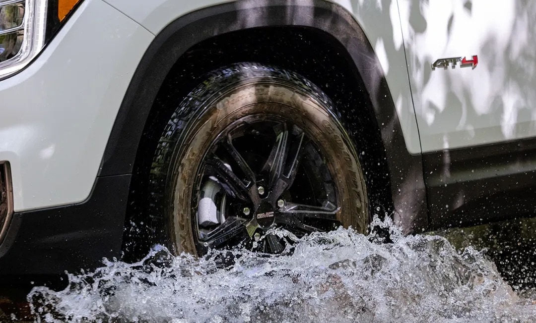 2024%20GMC%20terrain%20at4%20splashing%20through%20mud.jpeg