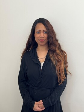 Staff member Alexis Charles from 0687d55c5fee