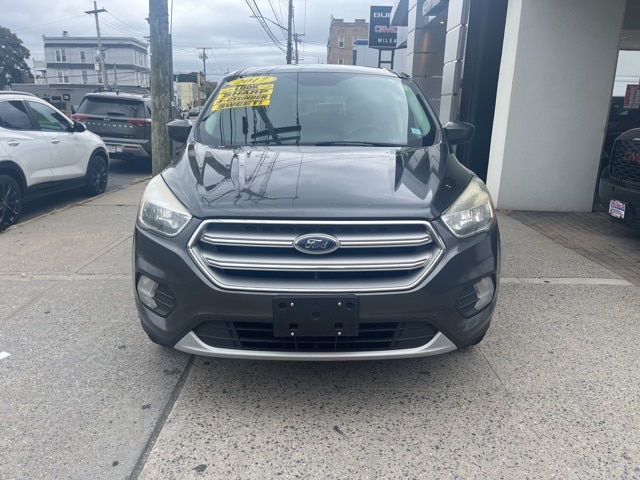 Used 2017 Ford Escape SE with VIN 1FMCU9GD7HUF00641 for sale in Bronx, NY