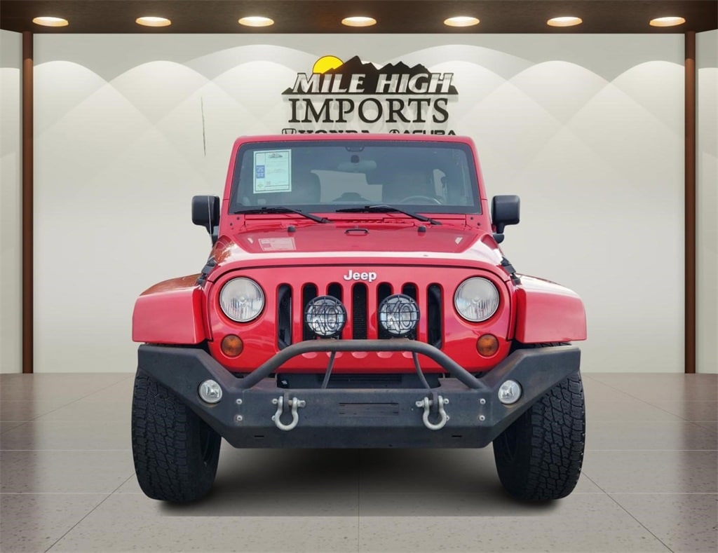 Used 2011 Jeep Wrangler Unlimited Sahara with VIN 1J4HA5H1XBL632686 for sale in Denver, CO