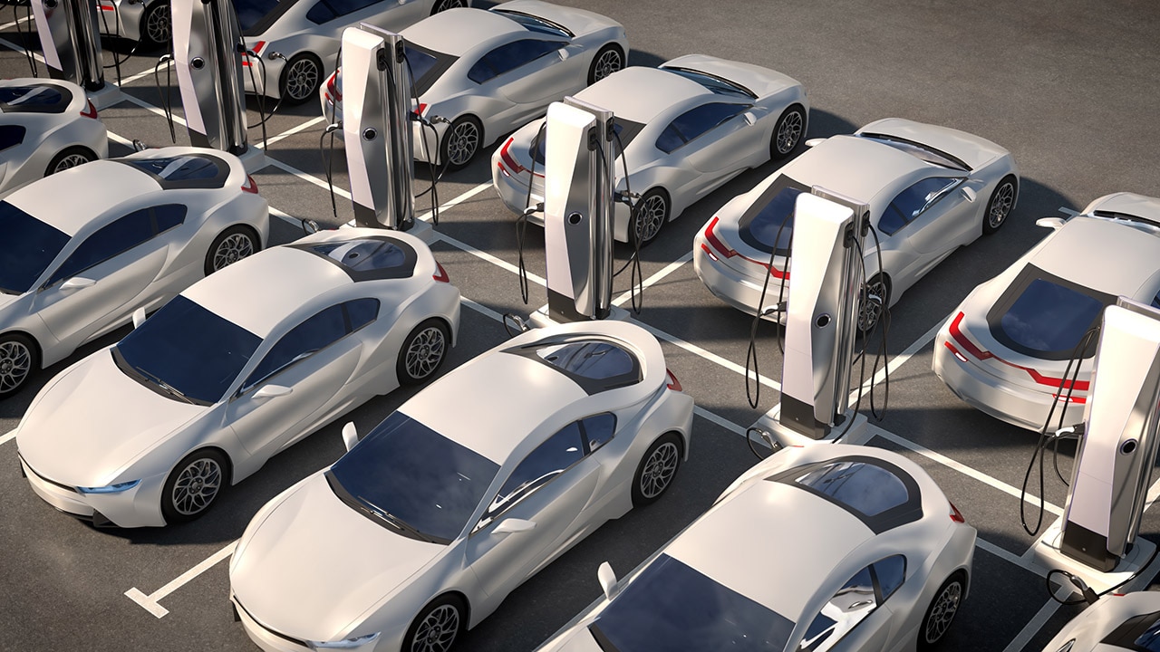 Row%20of%20EVs%20at%20Charging%20Stations.jpg