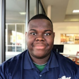 Staff member Ceaser Mack from 7ec337600a44