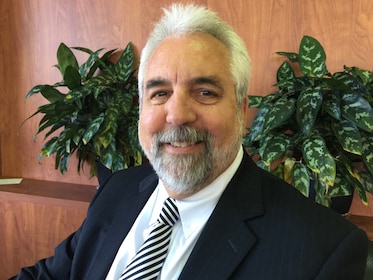 Staff member John McDonald from 7ec337600a44