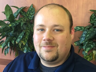 Staff member Andrew Buchanan from 7ec337600a44