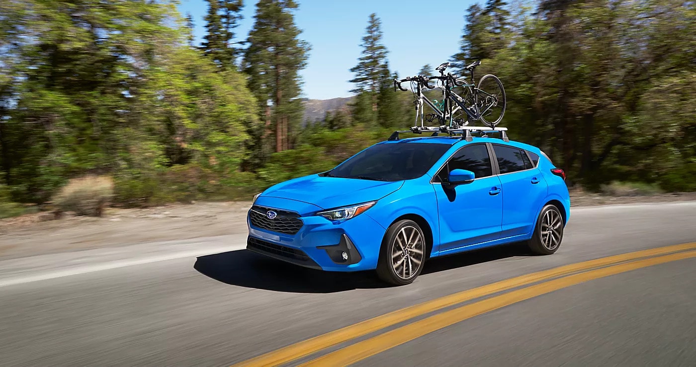 Subaru Certified Pre-Owned vehicle on the road