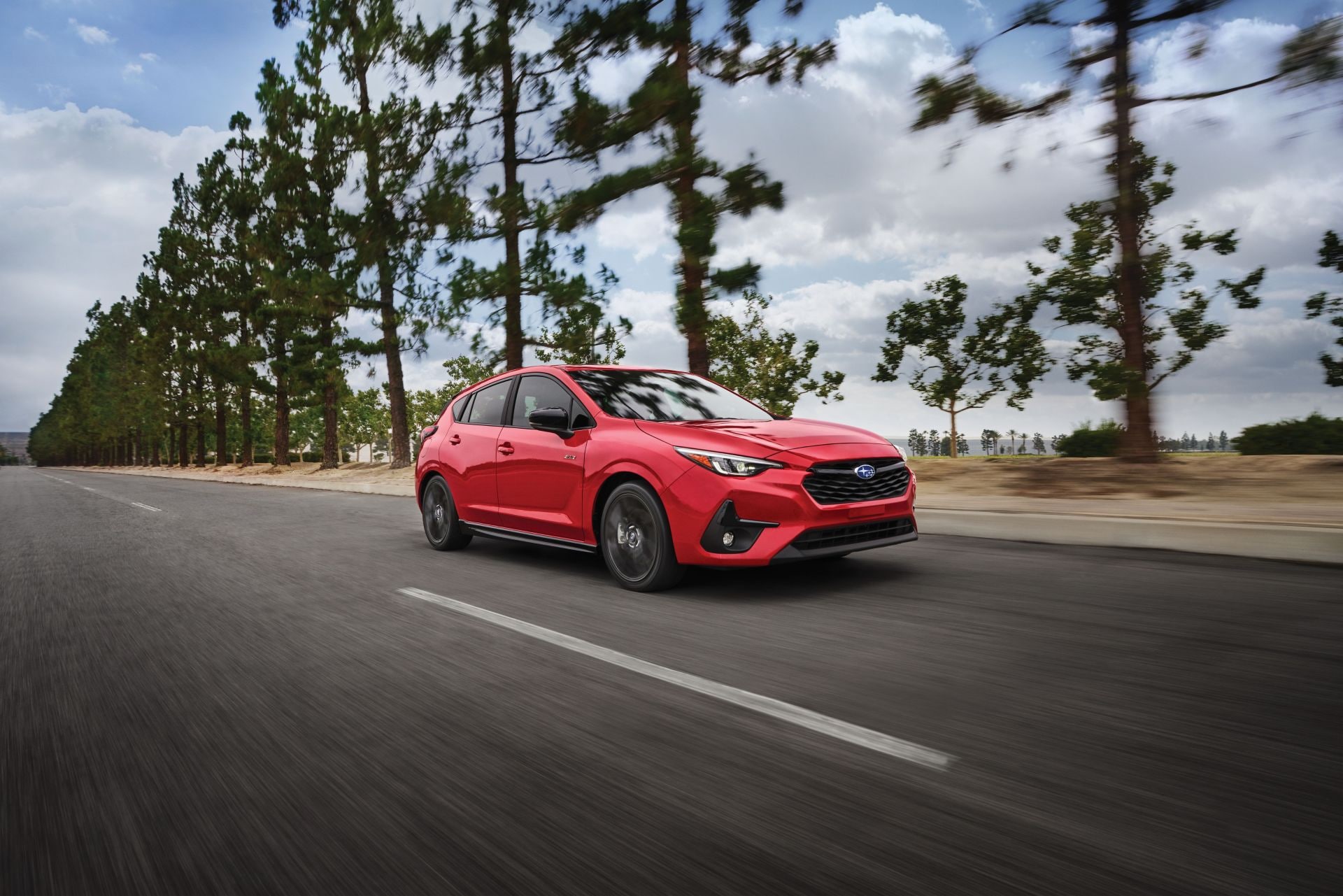A fuel-efficient Subaru sedan on the road