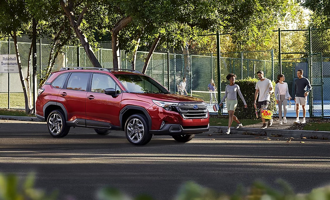 2026 Subaru Forester with a family at a park