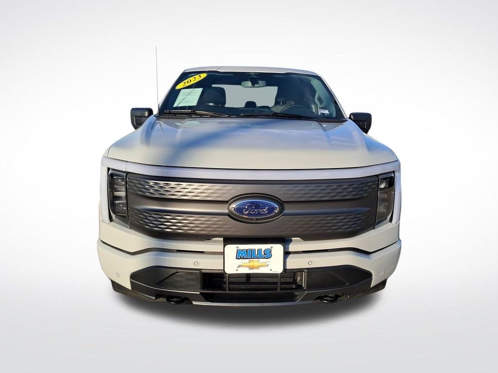 Used 2023 Ford F-150 Lightning XLT with VIN 1FTVW1EL8PWG61649 for sale in Davenport, IA