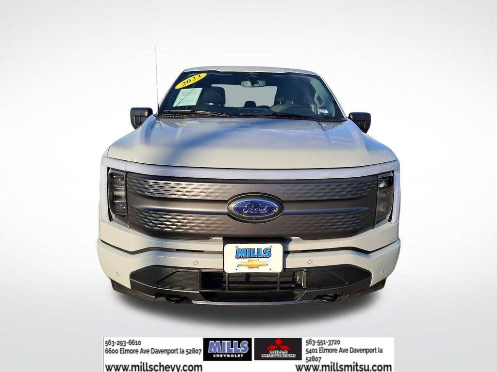 Used 2023 Ford F-150 Lightning XLT with VIN 1FTVW1EL8PWG61649 for sale in Davenport, IA