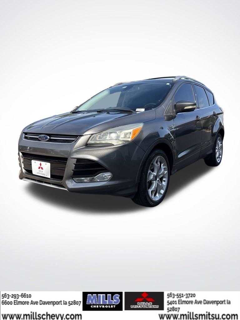 Used 2013 Ford Escape Titanium with VIN 1FMCU0J91DUB46075 for sale in Davenport, IA