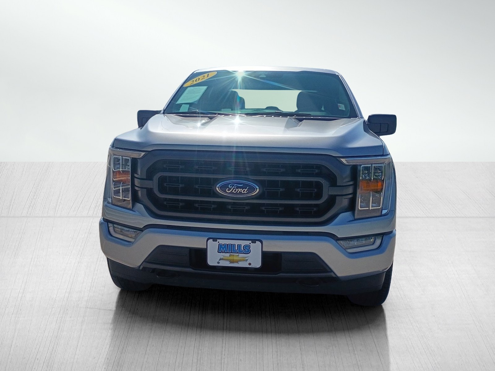 Used 2021 Ford F-150 XLT with VIN 1FTEW1EP8MFA08933 for sale in Davenport, IA