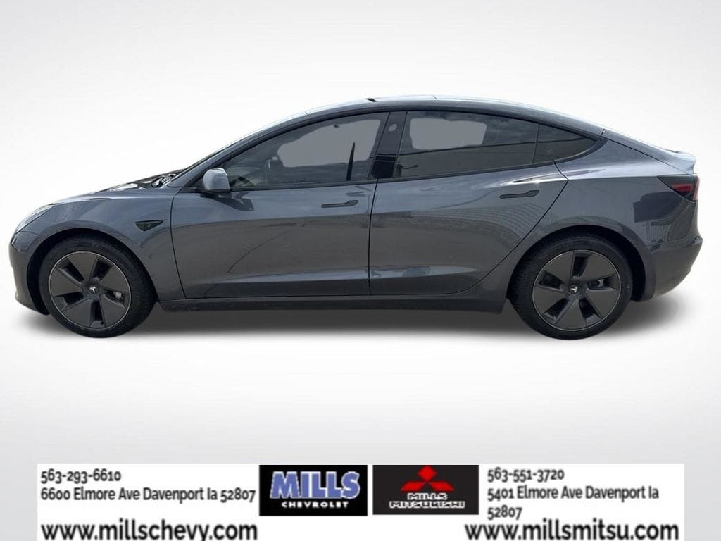 Used 2023 Tesla Model 3 Base with VIN 5YJ3E1EA7PF594703 for sale in Davenport, IA