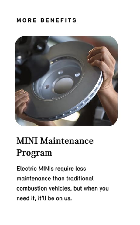 Closeup view of hands holding a circular piece of metal with the background blurred out.