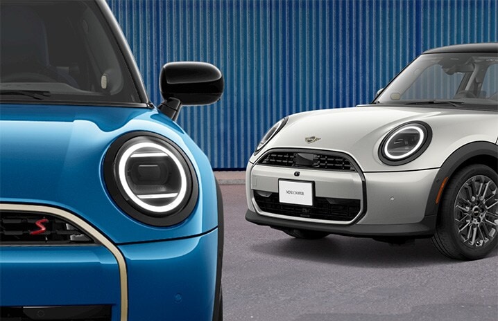 Two MINIs parked outside