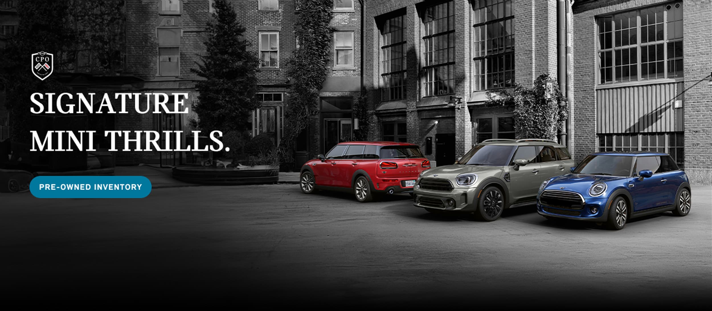 Three different MINI models parked together with the outline of a CPO shield
behind them
