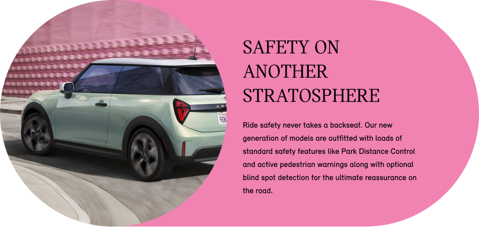 Three-quarters back view of a MINI
Cooper S 2 Door in Ocean Wave Green driving on a
road with its shadow underneath it and a pink
dotted wall in the background.