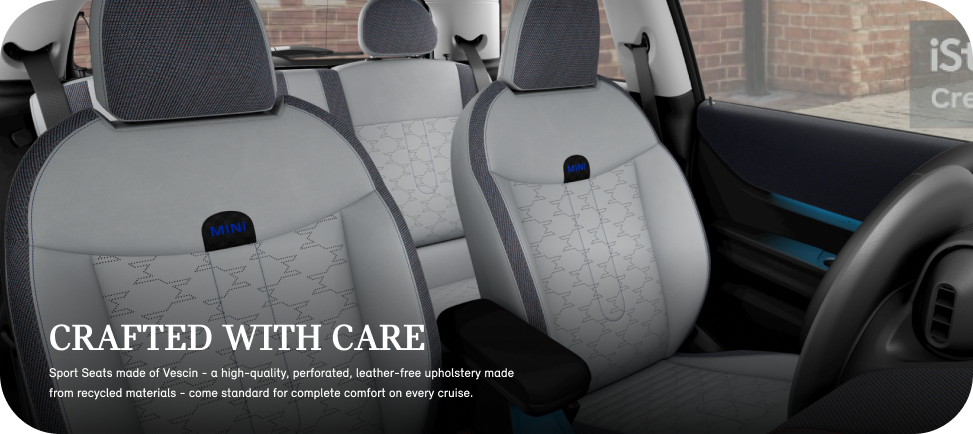7.png The interior of the 2025 MINI Cooper S 2 Door from the
passenger's side of the front windshield with a focus on the
Sports Seats.
