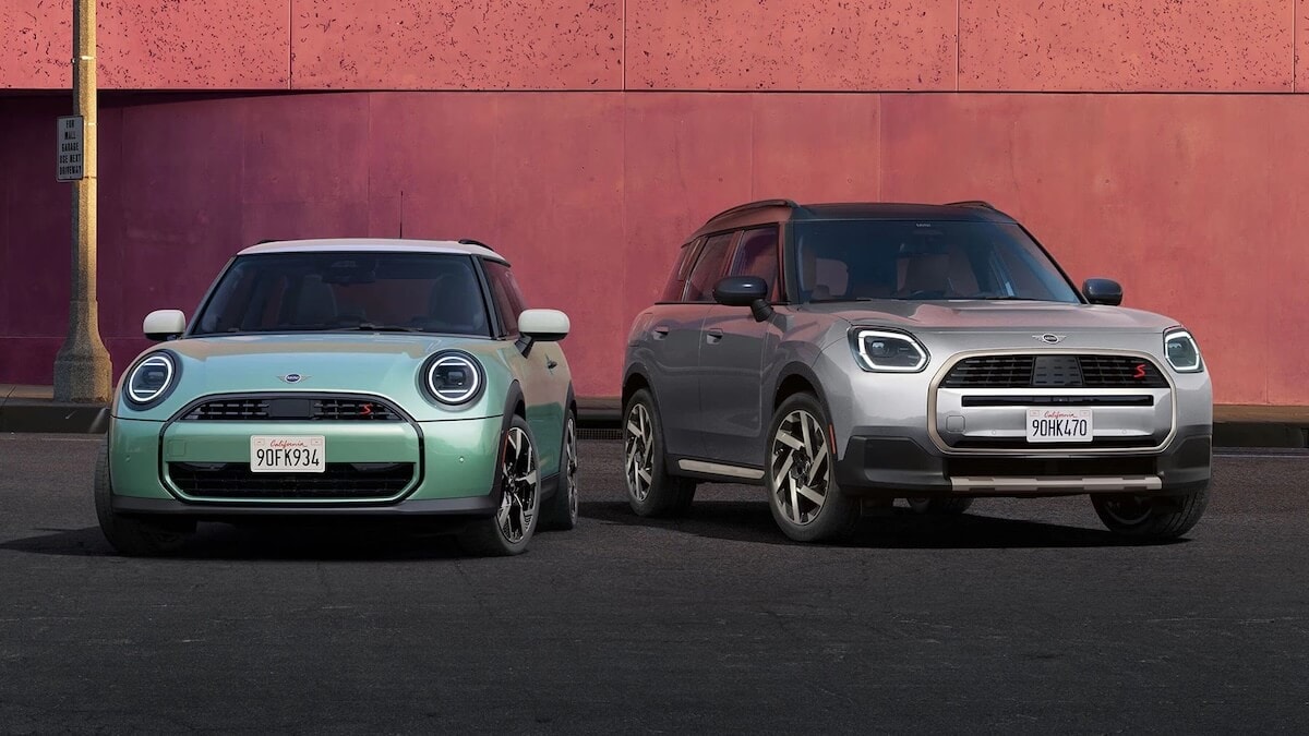 New MINI Hardtop 2 Door and Countryman parked outside an orange wall
