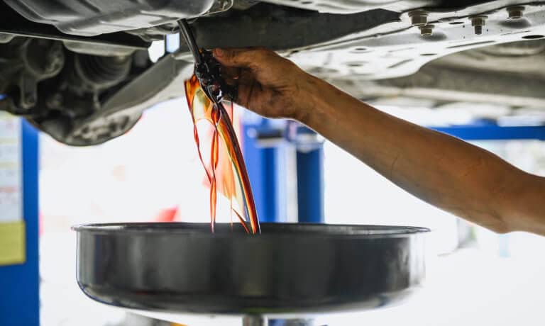 Service Oil Change Draining Oil
