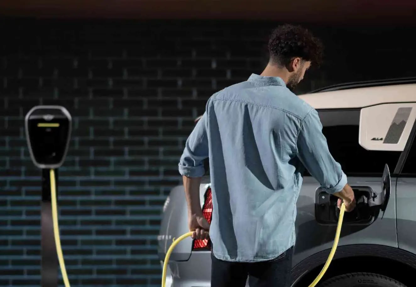Man charging a MINI Countryman