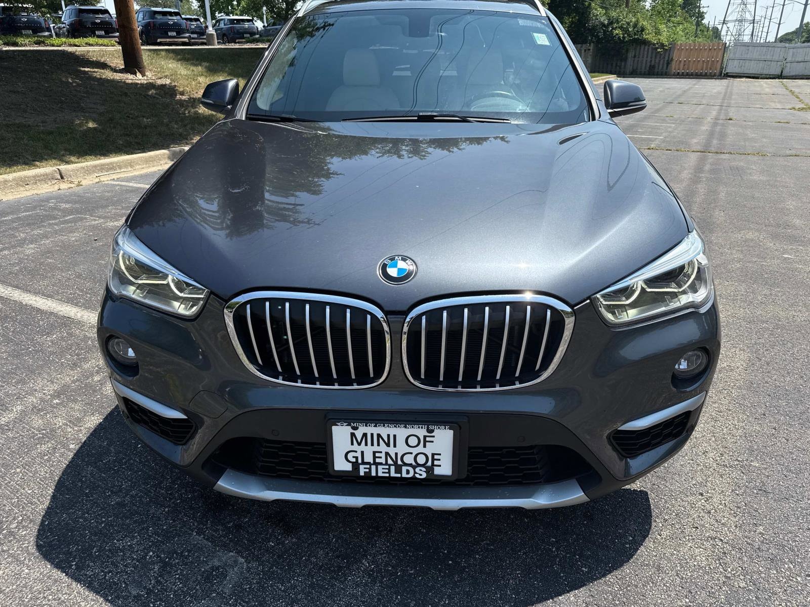 Used 2017 BMW X1 28i with VIN WBXHT3C34H5F77104 for sale in Glencoe, IL