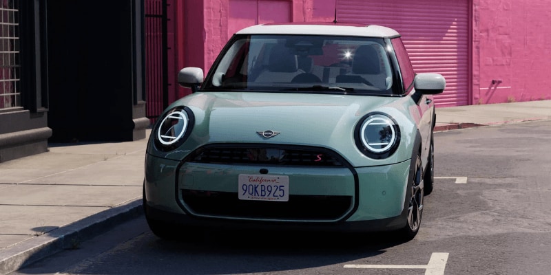 A MINI car parked on a roadside