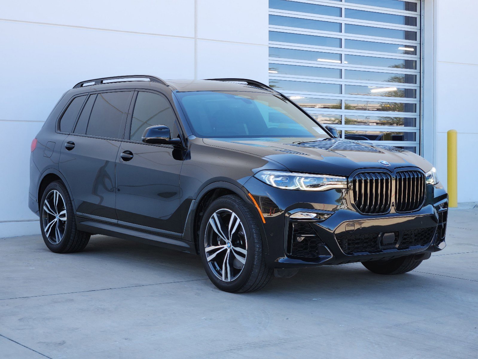 Used 2021 BMW X7 M50i with VIN 5UXCX6C05M9G14293 for sale in Plano, TX