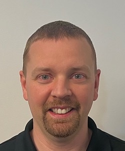 Staff member Chris Betsch from ID_1f773110e510